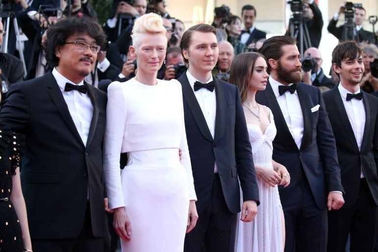 Director Bong Joon-Ho, Paul Dano, Lily Collins, Jake Gyllenhaal and Steven Yeun attend the &quot;Okja&quot; screening during the 70th annual Cannes Film Festival at Palais des Festivals on May 19, 2017 in Cannes, France