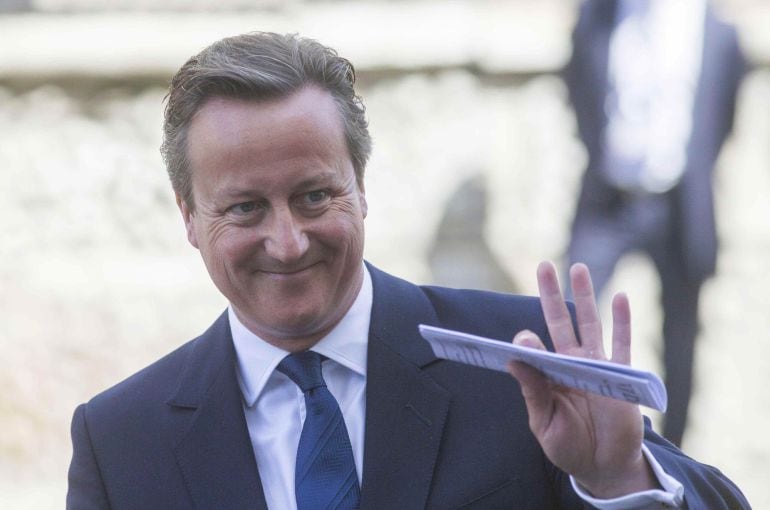 Britain&#039;s Prime Minister David Cameron leaves St Martin&#039;s in the Fields church after attending a service to commemorate the 70th anniversary of VJ Day in London, Britain August 15, 2015. REUTERS/Neil Hall