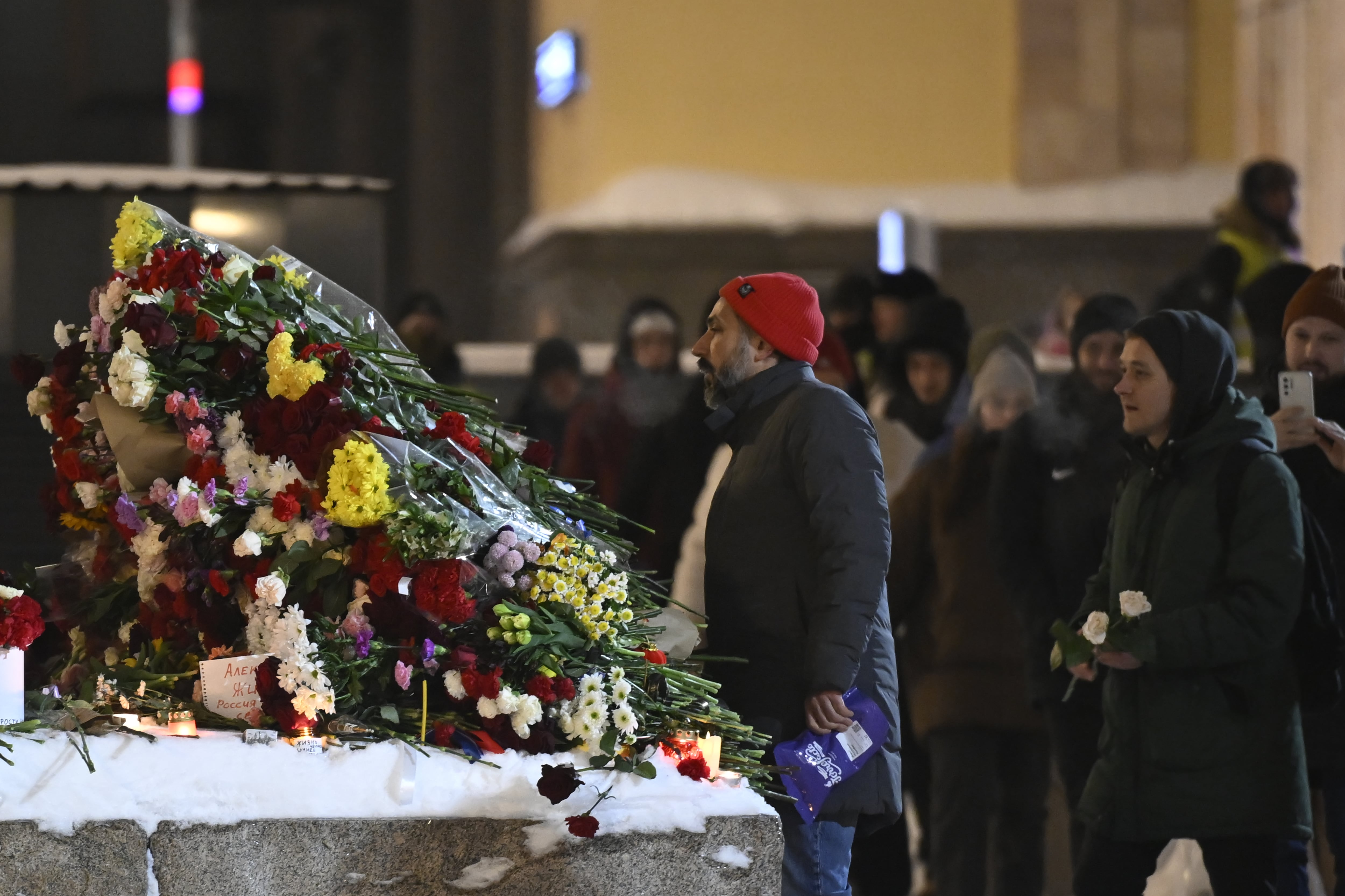 Some citizens lay flowers at the Solovetsky Stone to commemorate the Russian opposition leader Alexei Navalny after he died in a prison colony where he was serving his sentence, in Moscow, Russia on February 16, 2024.