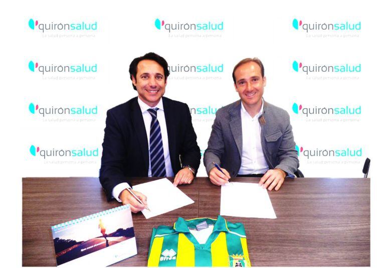 Feria y Moya firman el acuerdo.