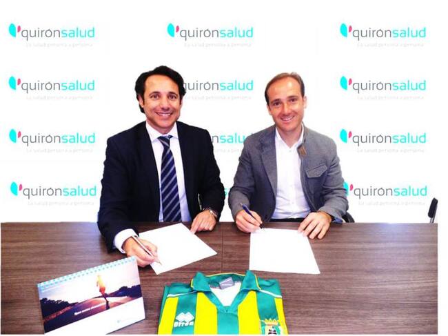 Feria y Moya firman el acuerdo.