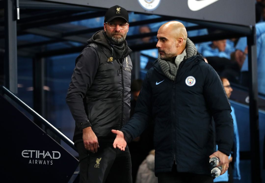 Klopp y Guardiola, en un partido de la Premier.