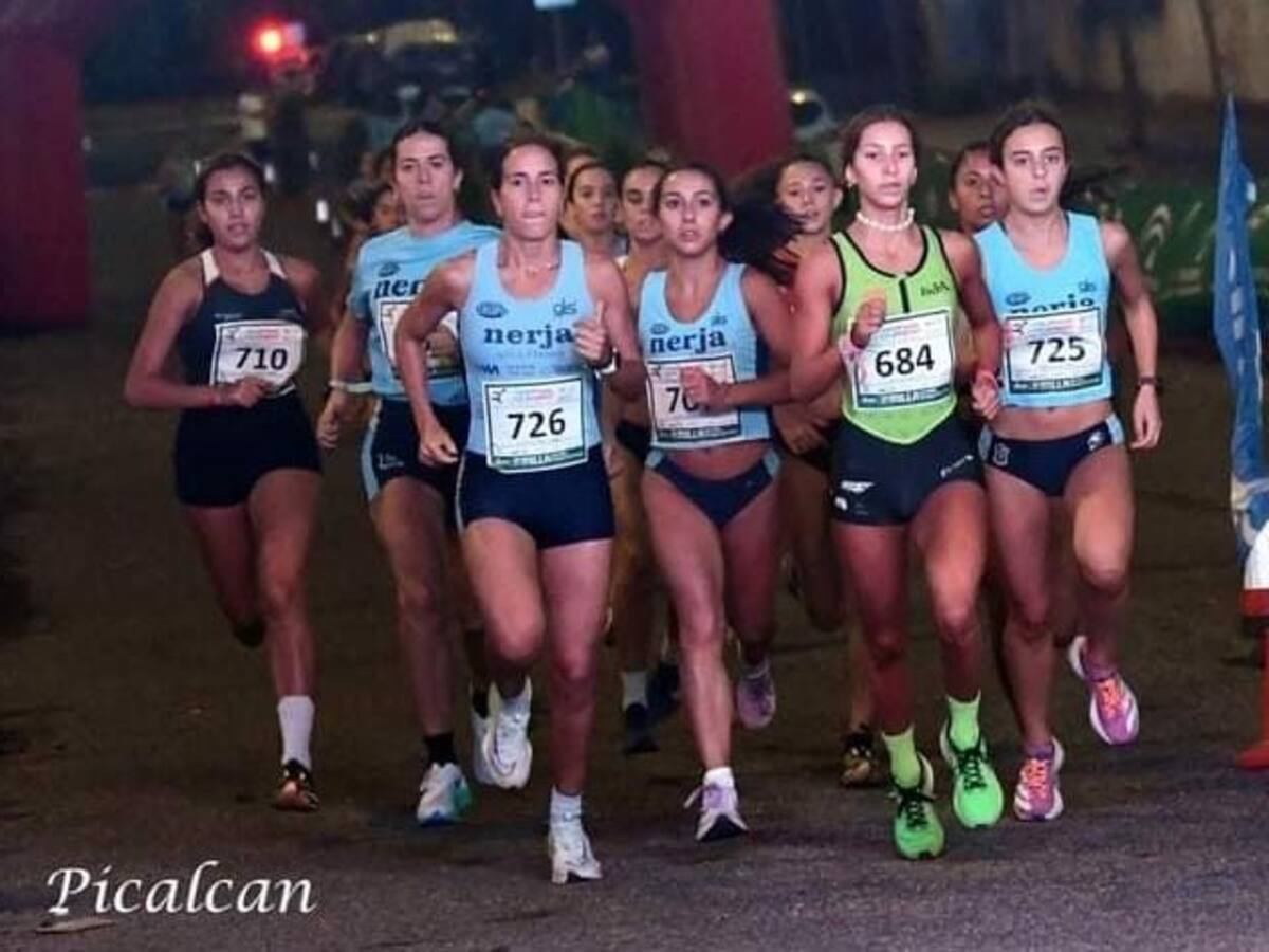 Claudia Estévez y Mario Espárraga del Trops Cueva de Nerja campeones del Milla Urbana de Navidad de Nerja