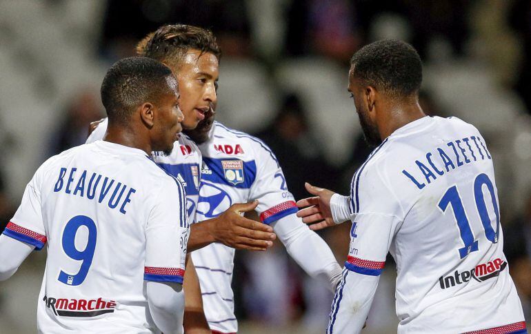 Olympique Lyon&#039;s Corentin Tolisso (2nd L) celebrates with team mates after scoring against Bastia during their French Ligue 1 soccer match at the Gerland stadium in Lyon, France, September 23, 2015.  REUTERS/Robert Pratta