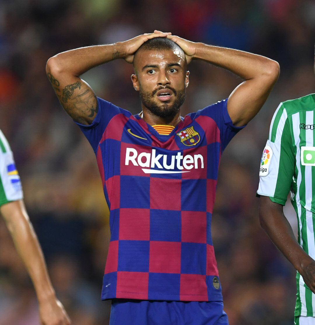 BARCELONA, SPAIN - AUGUST 25: Rafinha of Barcelona and Emerson de Souza of Real Betis look on during the Liga match between FC Barcelona and Real Betis at Camp Nou on August 25, 2019 in Barcelona, Spain. (Photo by Alex CaparrosGetty Images)