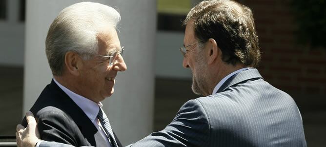 Rajoy y Monti se reúnen en el Palacio de la Moncloa tras haber escuchado juntos las palabras del presidente del BCE, Mario Draghi