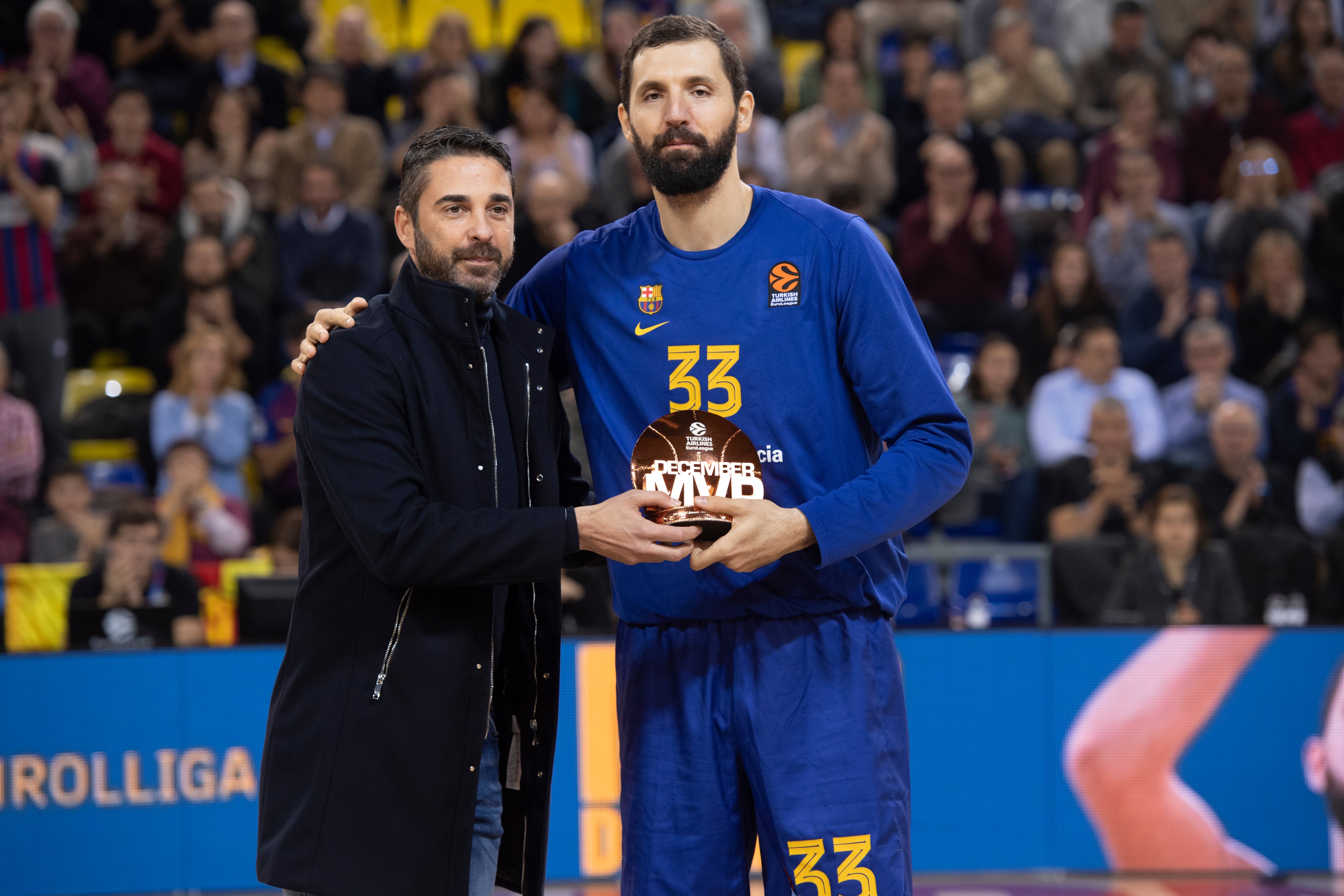 Juan Carlos Navarro junto a Nikola Mirotic