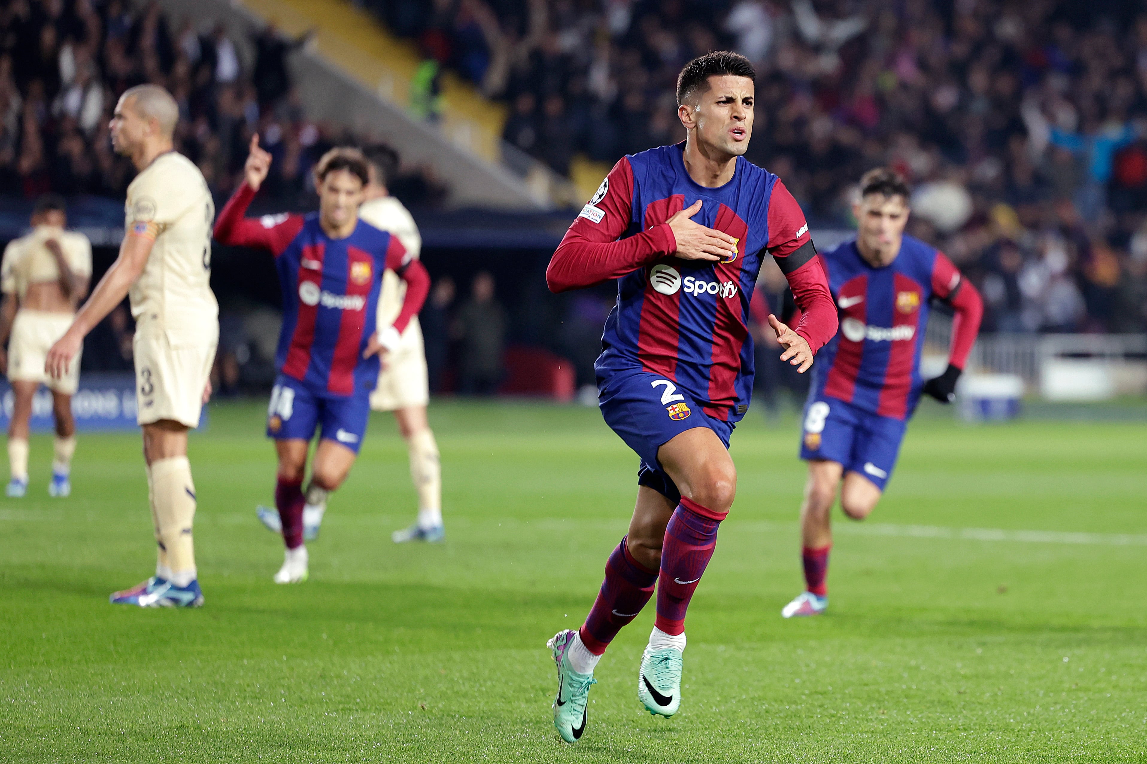 BARCELONA, SPAIN - NOVEMBER 28: Joao Cancelo of FC Barcelona celebrates 1-1 during the UEFA Champions League  match between FC Barcelona v FC Porto at the Lluis Companys Olympic Stadium on November 28, 2023 in Barcelona Spain (Photo by David S.Bustamante/Soccrates/Getty Images)