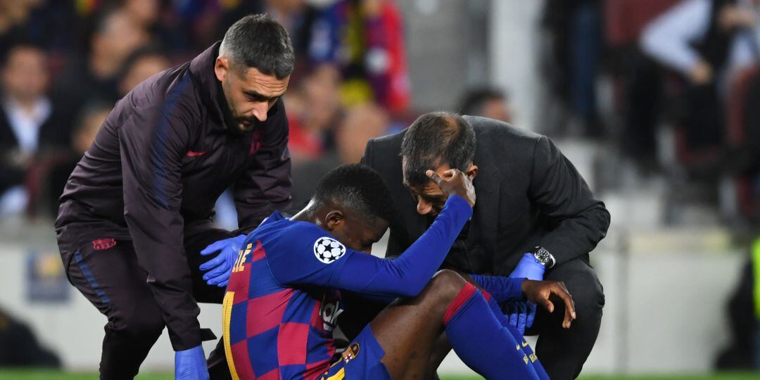 Dembélé, tras caer lesionado ante el Borussia Dortmund