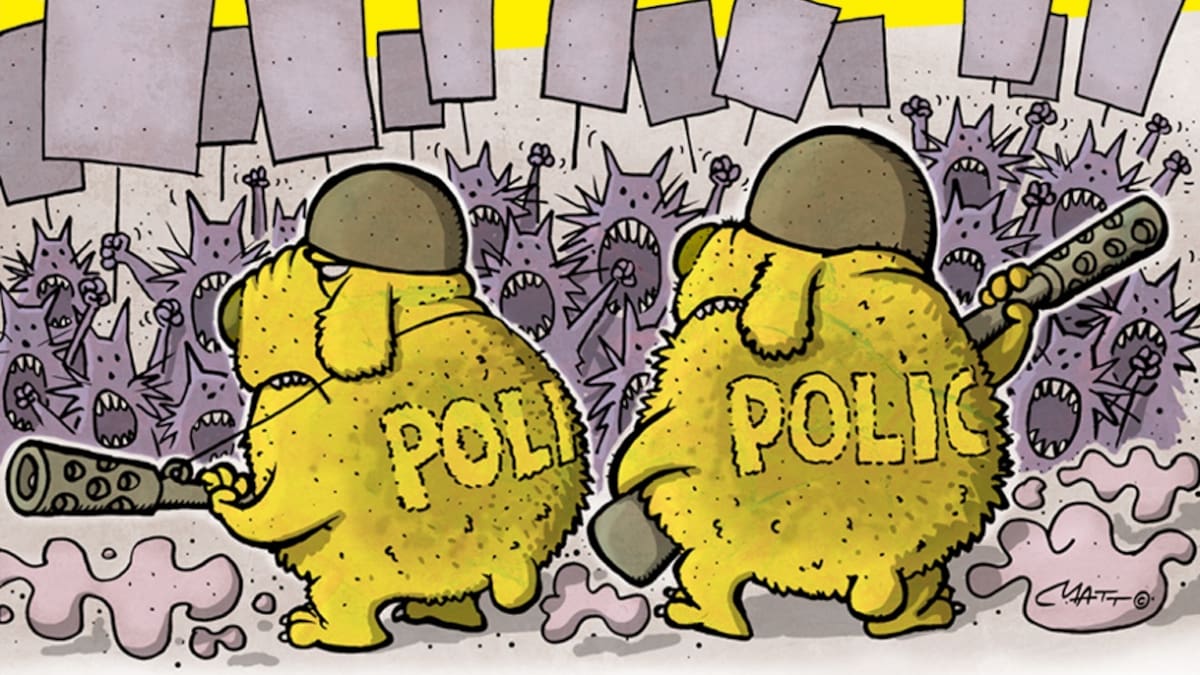 Perros con metralleta vigilan a los manifestantes