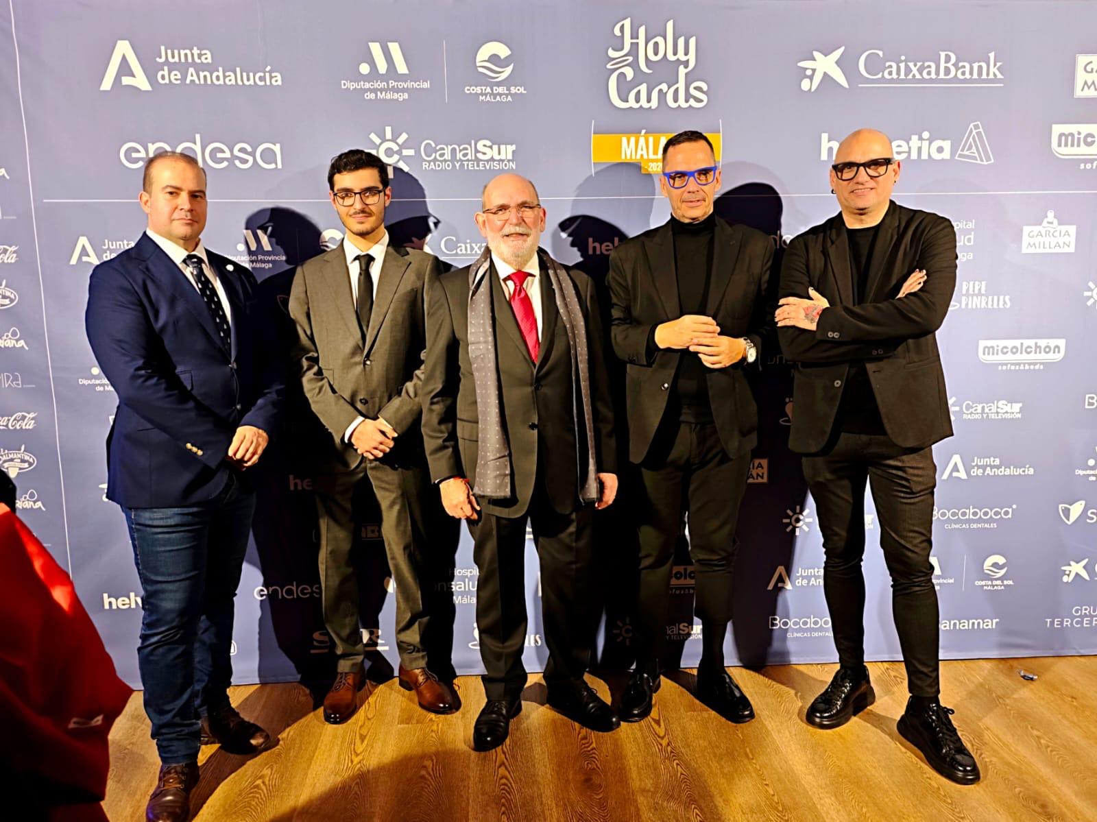 El grupo de fotógrafos junto con el director artístico de las Holy Cards 2026 de Málaga durante su presentación el pasado martes, 27 de enero