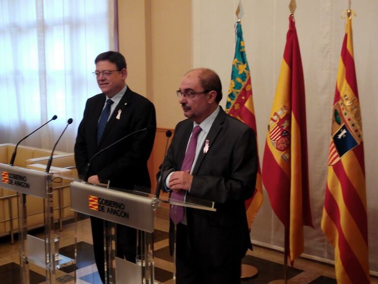 El Presidente de la Comunidad Valenciana, Ximo Puig, (izquierda) y el Presidente de Aragón, Javier Lambán, (derecha).