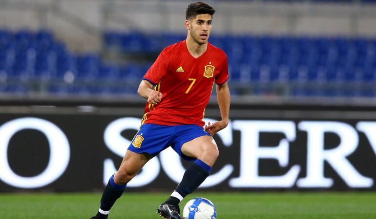 Marco Asensio, durante un partido de la Selección