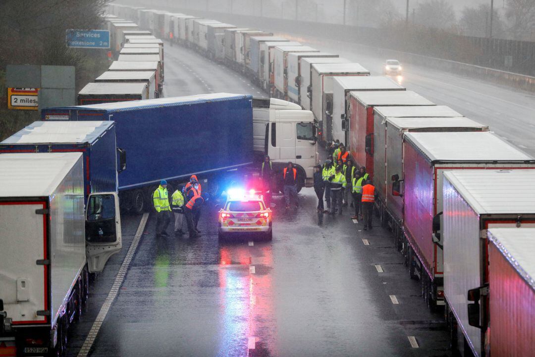 A lorry blocks M20 motorway where trucks queue to port Dover, as EU countries impose a travel ban from the UK following the coronavirus disease (COVID-19) outbreak, near Ashford, Britain, December 23, 2020. REUTERS Peter Nicholls