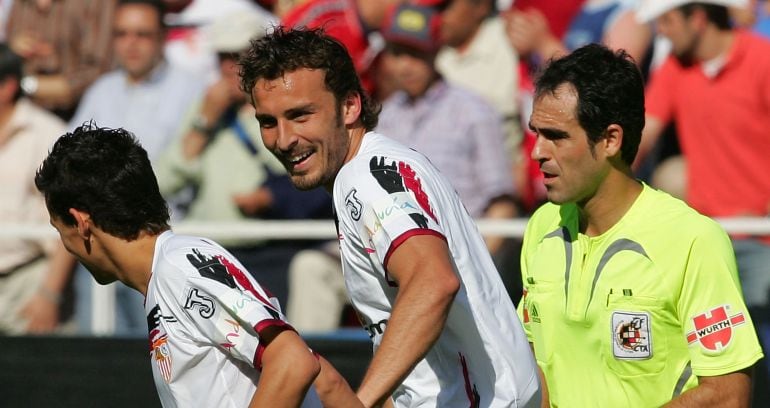 Navas y Puerta sonríen durante un partido del Sevilla en una foto de archivo