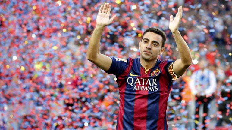 Xavi celebra un título con el FC Barcelona