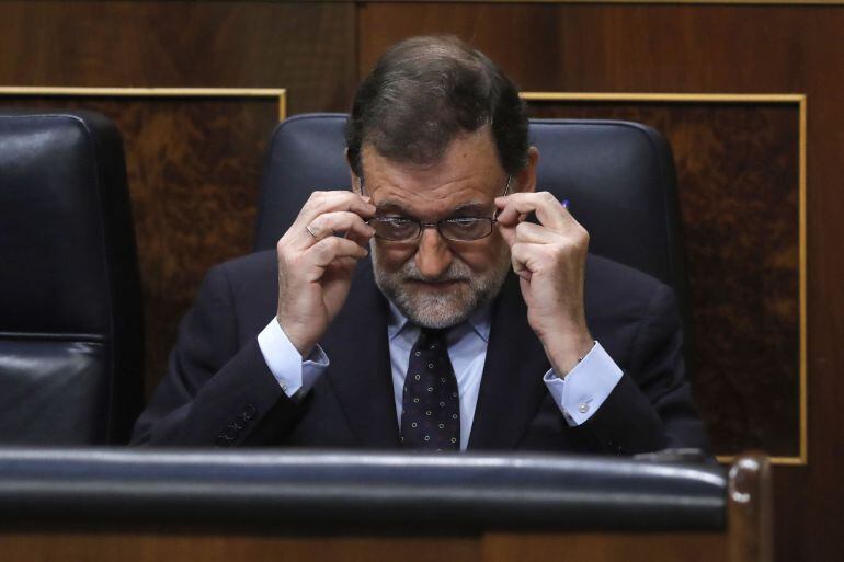 El presidente del Gobierno, Mariano Rajoy, en su escaño durante la sesión de control al Gobierno 