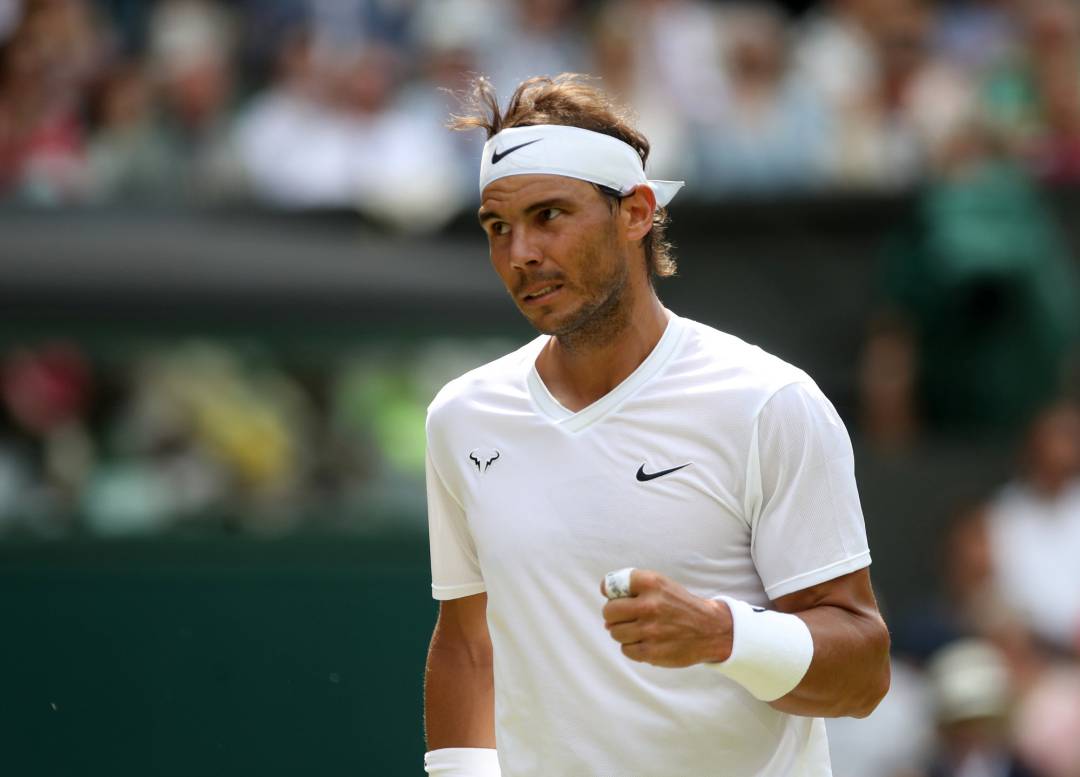 Rafa Nadal celebra un juego durante el partido