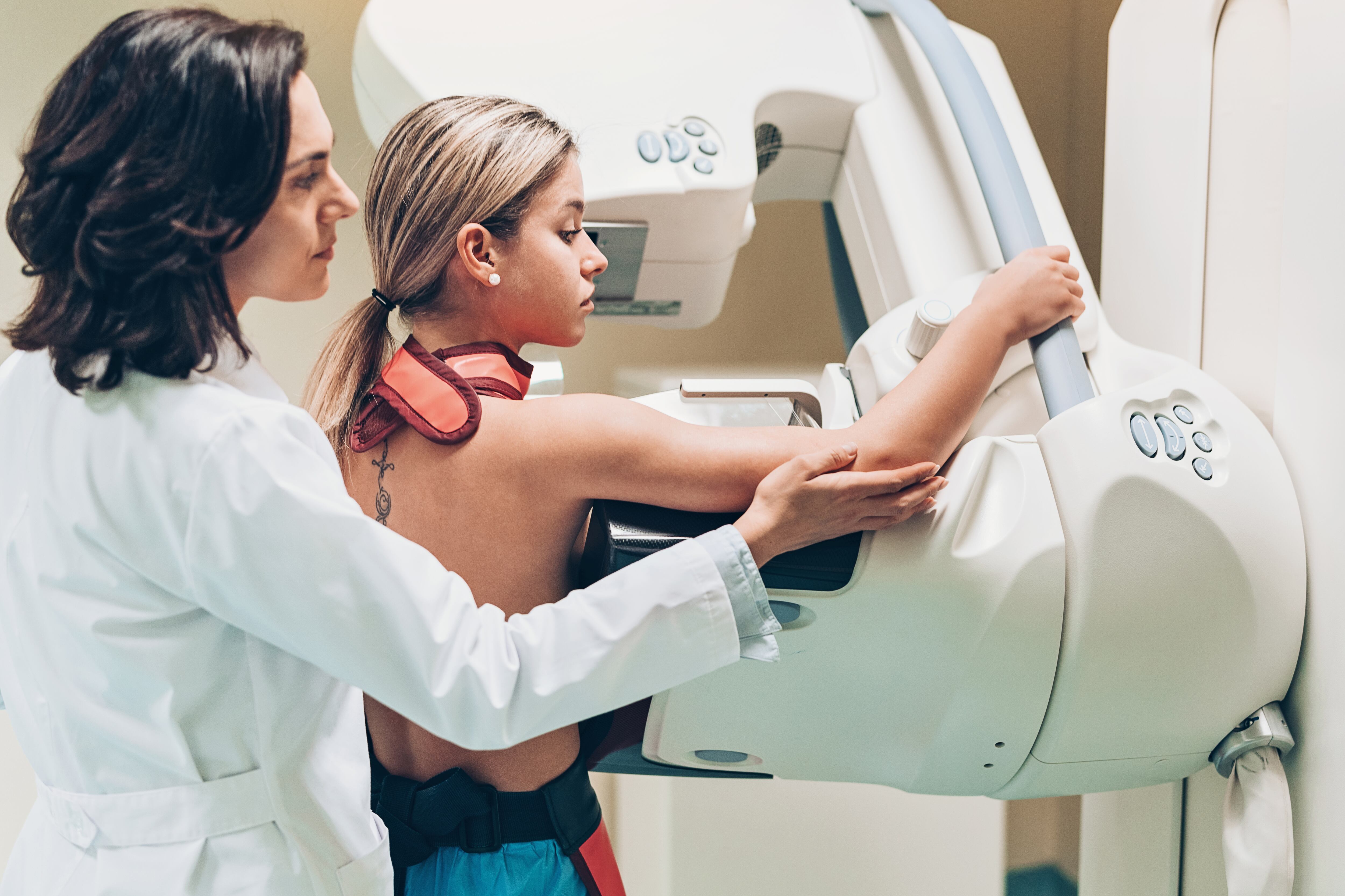 Doctor and patient making a mammography