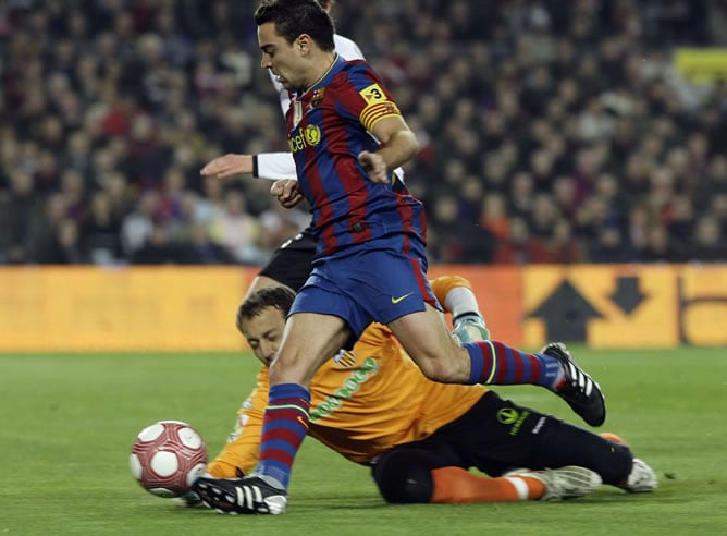 Xavi, durante el partido liguero ante el Valencia