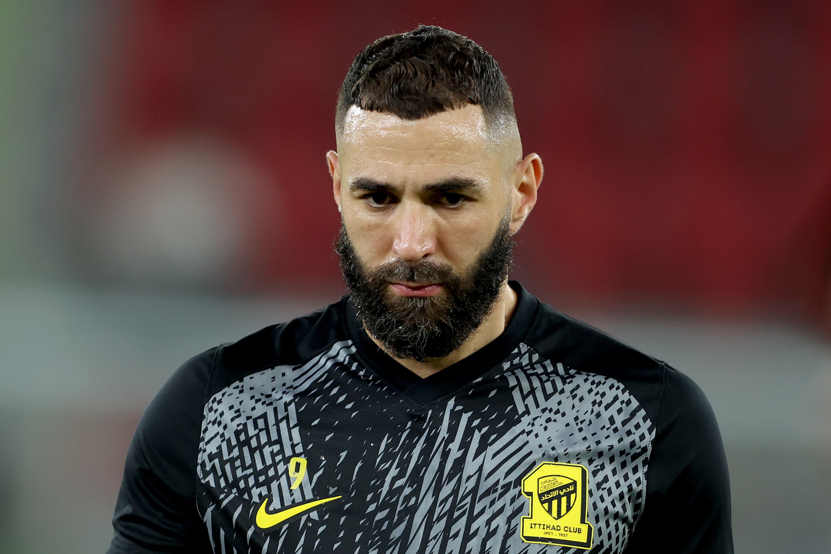 JEDDAH, SAUDI ARABIA - DECEMBER 26: Karim Benzema of Al-Ittihad looks on prior to the Saudi Pro League match between Al-Ittihad and Al-Nassr at Prince Abdullah Al Faisal Stadium on December 26, 2023 in Jeddah, Saudi Arabia. (Photo by Yasser Bakhsh/Getty Images)