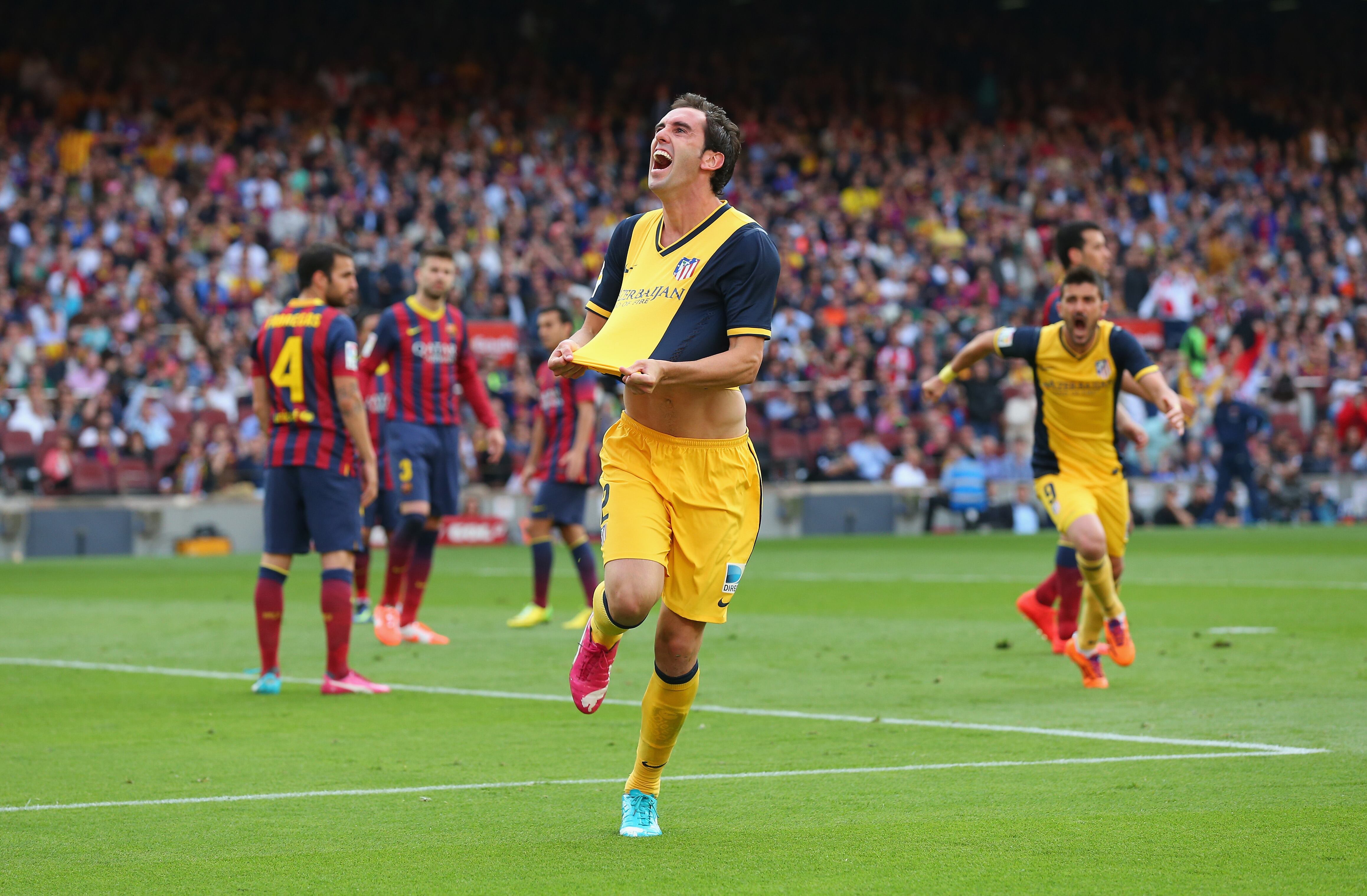 Diego Godín celebra el gol con el que proclamó campeón de Liga al Atlético en 2014