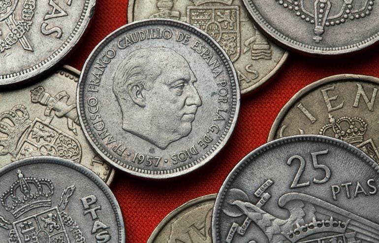 Una moneda con la imagen de Franco del año 1957.