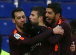 Soccer Football - La Liga Santander - Espanyol vs FC Barcelona - RCDE Stadium, Barcelona, Spain - February 4, 2018   Barcelona’s Gerard Pique celebrates with Sergio Busquets and Luis Suarez after scoring their first goal    REUTERS/Albert Gea
