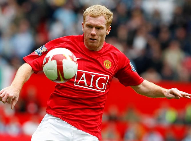 Scholes, durante un partido con el Manchester