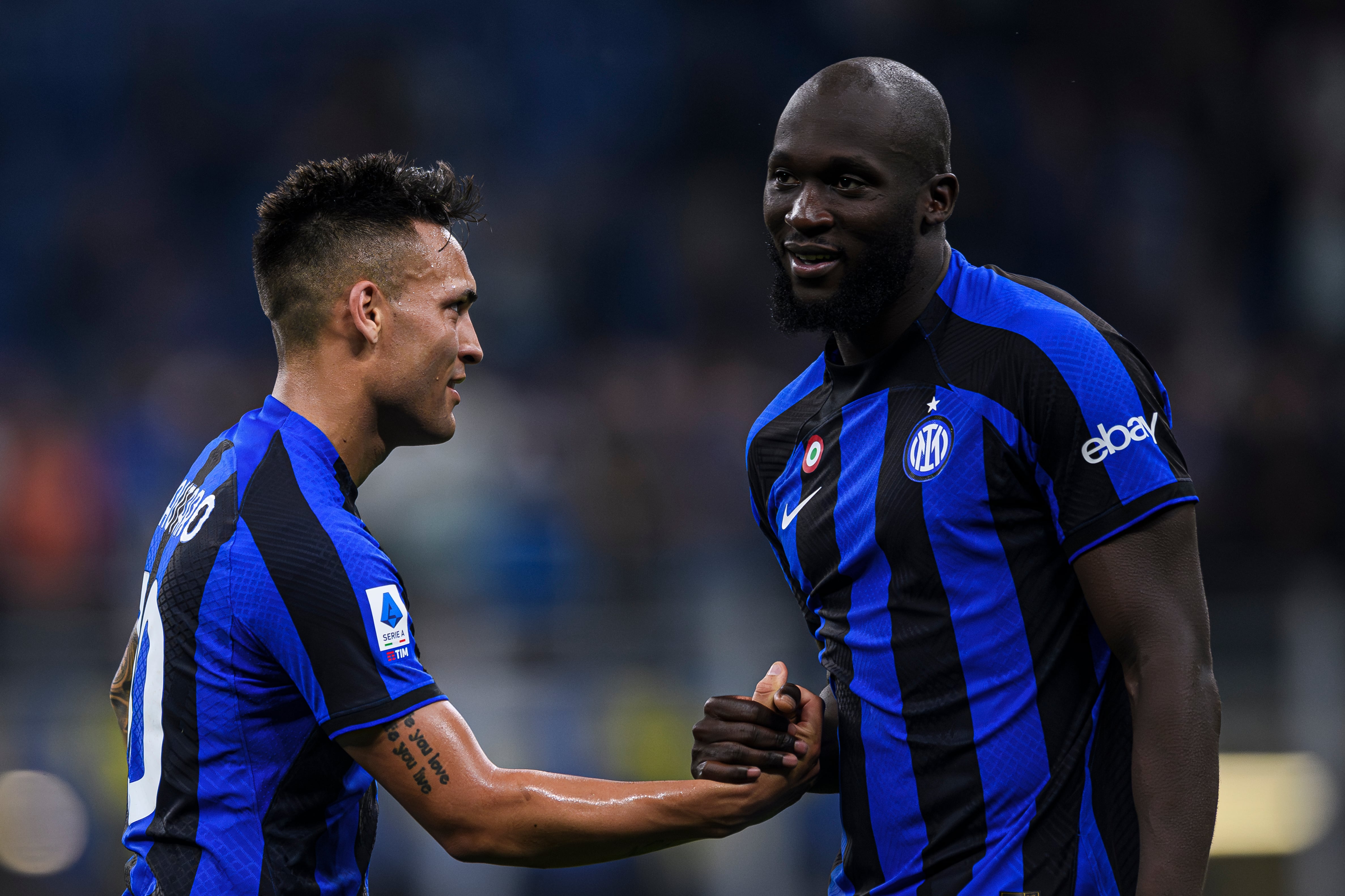 Lautaro Martinez (L) of FC Internazionale shakes hands with