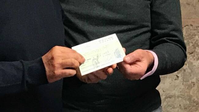 El cheque que salda la deuda histórica