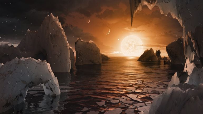 Recreación artística de cómo podría ser la superficie del exoplaneta TRAPPIST-1f, localizado en el sistema TRAPPIST-1, en la constelación Acuario. A tan solo 40 años luz de la Tierra hay un sistema estelar con siete planetas de masa similar al nuestro, tr