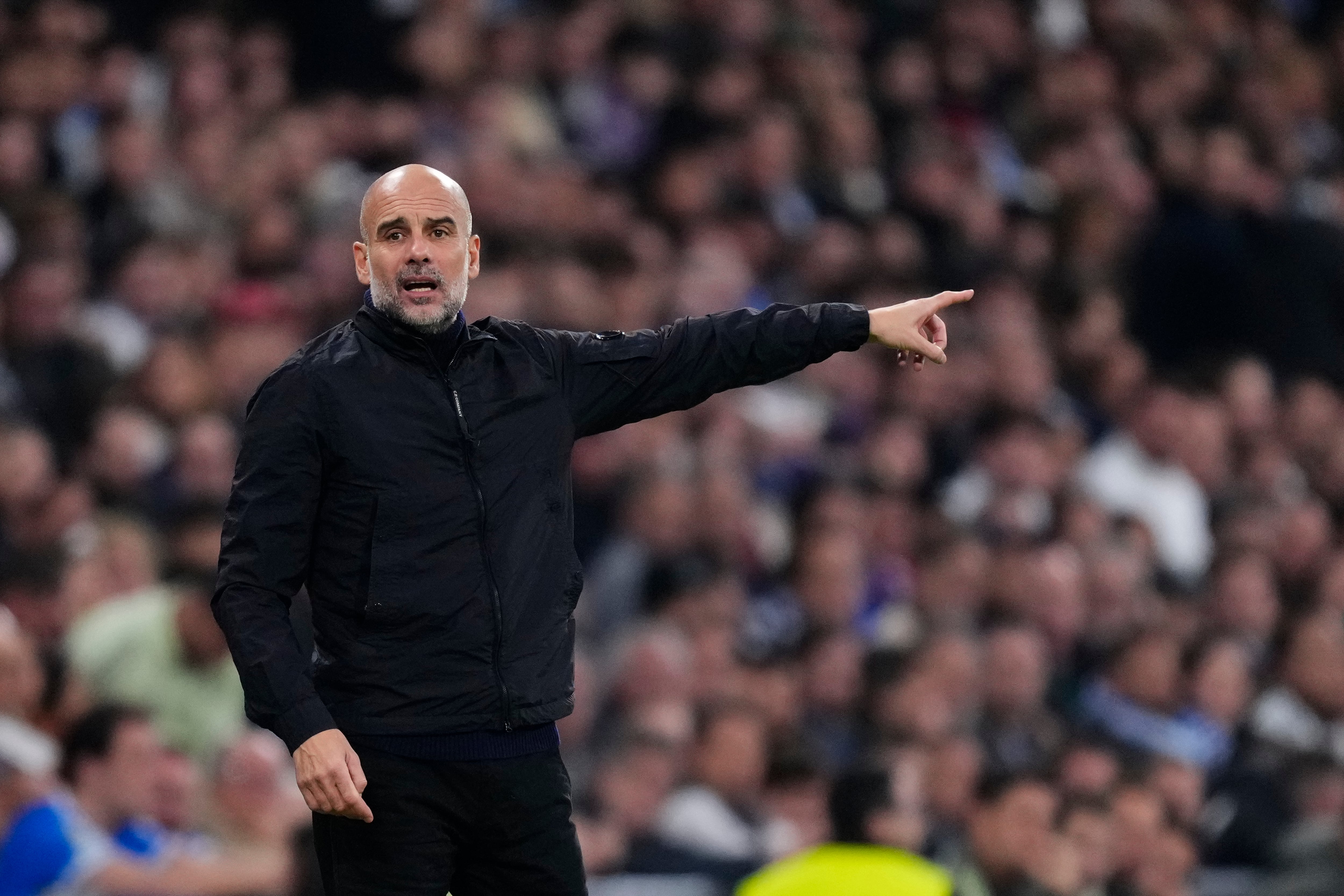 Pep Guardiola head coach of Manchester City and Spain during the UEFA Champions League 2025/26 League Phase MD6 match between Real Madrid C.F. and Manchester City at Estadio Santiago Bernabeu on December 10, 2025 in Madrid, Spain. (Photo by Jose Breton/Pics Action/NurPhoto via Getty Images)