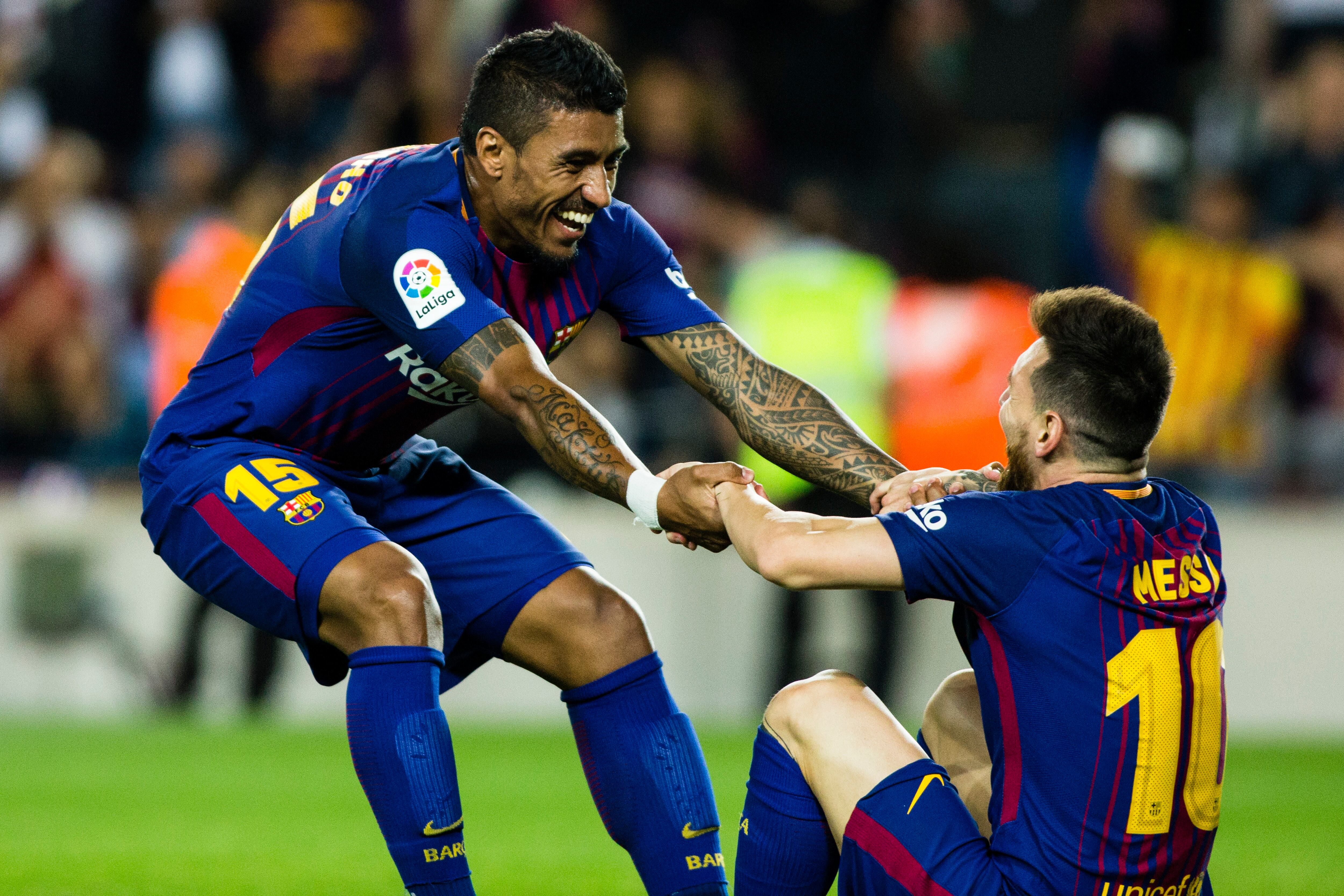 Paulinho y Leo Messi, durante un partido de LaLiga entre FC Barcelona y Eibar