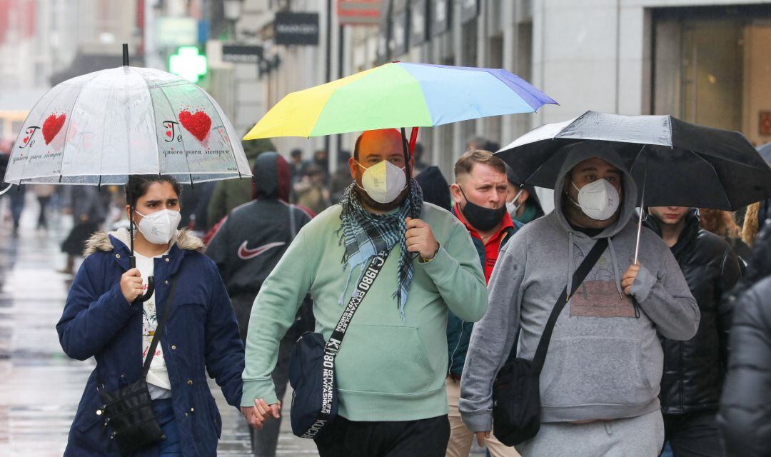 Personas con mascarillas para evitar la transmisión del coronavirus.