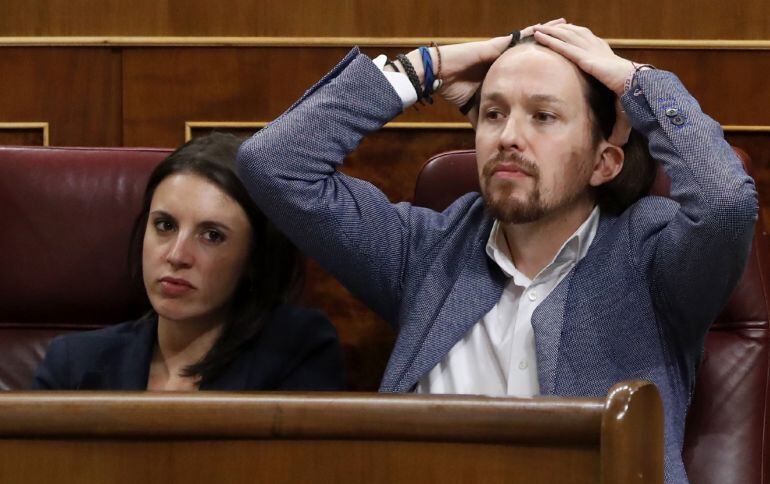 El líder de Podemos, Pablo Iglesias, y la portavoz en el Congreso de la formación morada, Irene Montero.