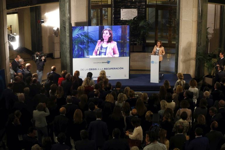 MADRID, 14/10/2015.- La vicepresidenta del Ejecutivo, Soraya Sáenz de Santamaría, durante su intervención en el acto que el PP ha celebrado hoy en el Congreso de los Diputados