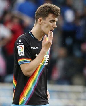 Diego Llorente y Quini, en el choque ante la Real en Anoeta.