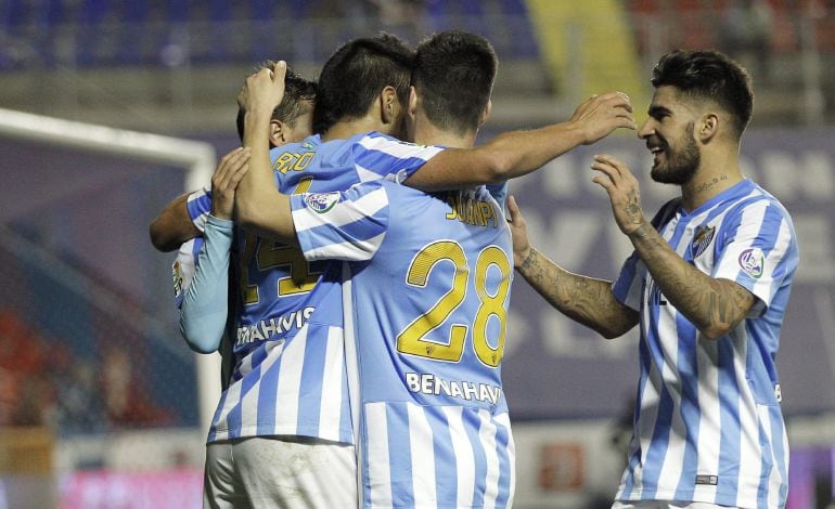 Samuel, Juanpi, Recio y Juanmi celebran uno de los goles del Málaga ante el Levante