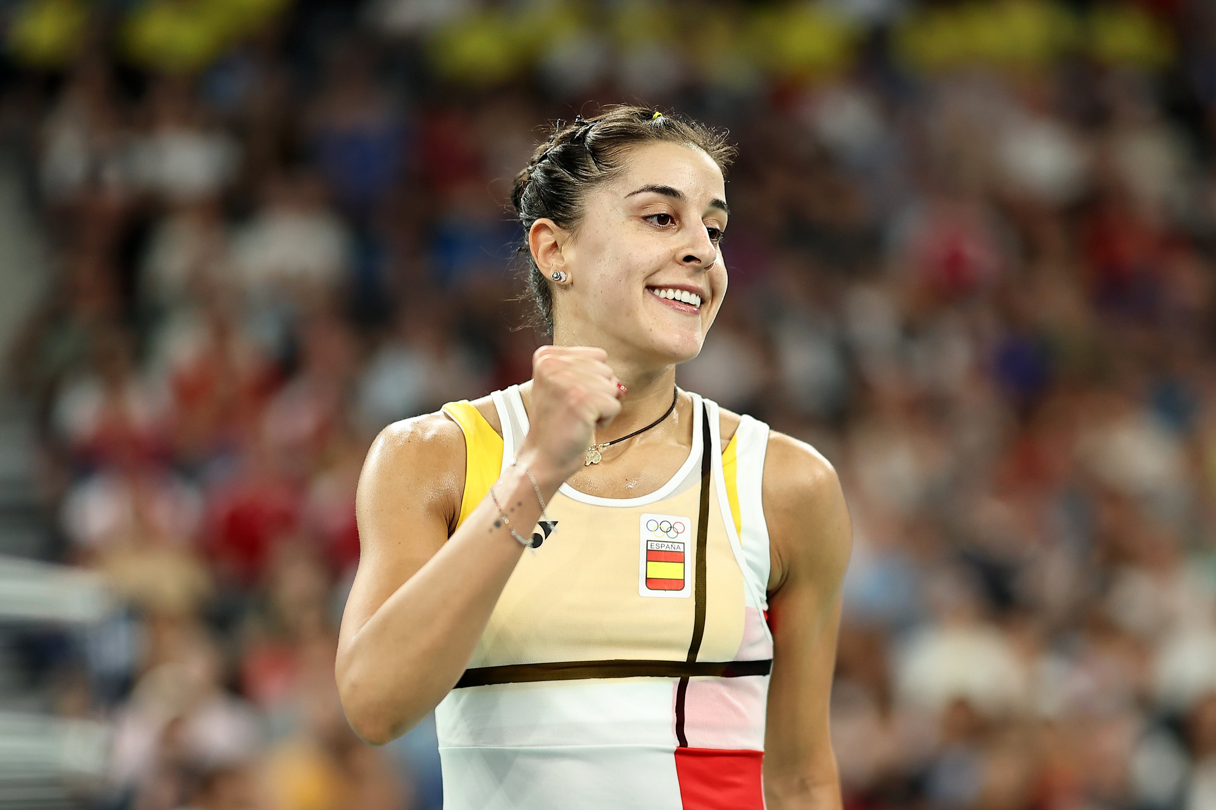 PARIS, FRANCE - JULY 31: Carolina Marin of Team Spain celebrates against Rachael Darragh of Team Ireland during the Badminton Women's Singles Group Play Stage matchon day five of the Olympic Games Paris 2024 at Porte de La Chapelle Arena on July 31, 2024 in Paris, France. (Photo by Lintao Zhang/Getty Images)