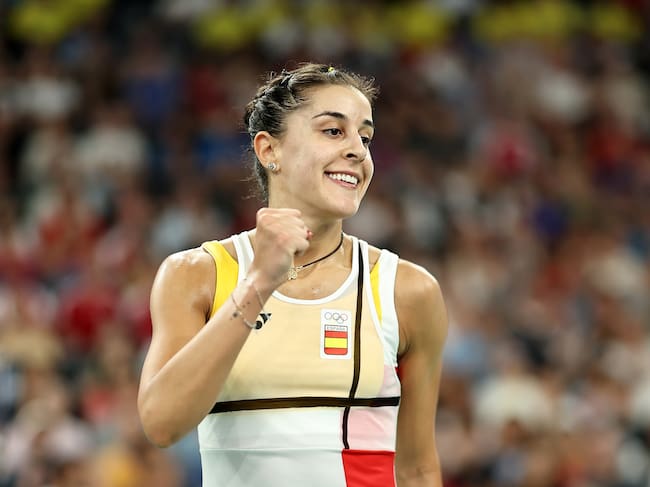 PARIS, FRANCE - JULY 31: Carolina Marin of Team Spain celebrates against Rachael Darragh of Team Ireland during the Badminton Women's Singles Group Play Stage matchon day five of the Olympic Games Paris 2024 at Porte de La Chapelle Arena on July 31, 2024 in Paris, France. (Photo by Lintao Zhang/Getty Images)