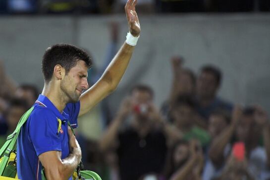 2016 Rio Olympics - Tennis - Preliminary - Men&#039;s Singles First Round - Olympic Tennis Centre - Rio de Janeiro, Brazil - 07/08/2016. Novak Djokovic (SRB) of Serbia reacts after losing his match against Juan Martin Del Potro (ARG) of Argentina. REUTERS/Toby