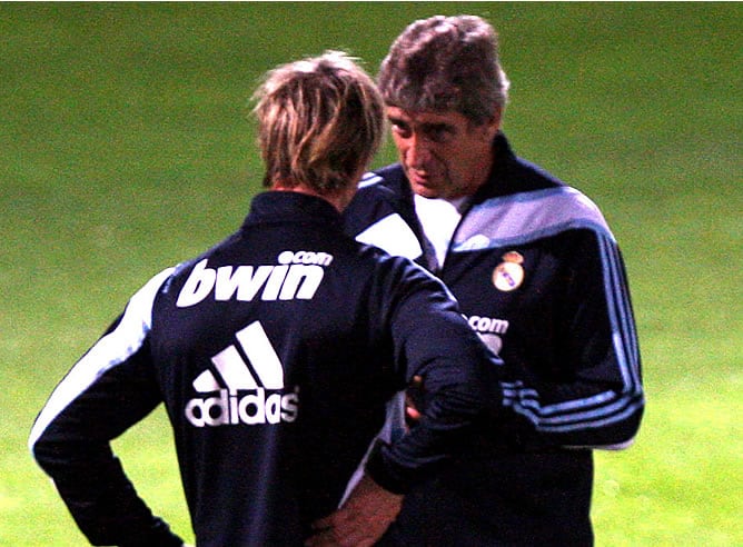 Guti y Pellegrini charlan durante un entrenamiento