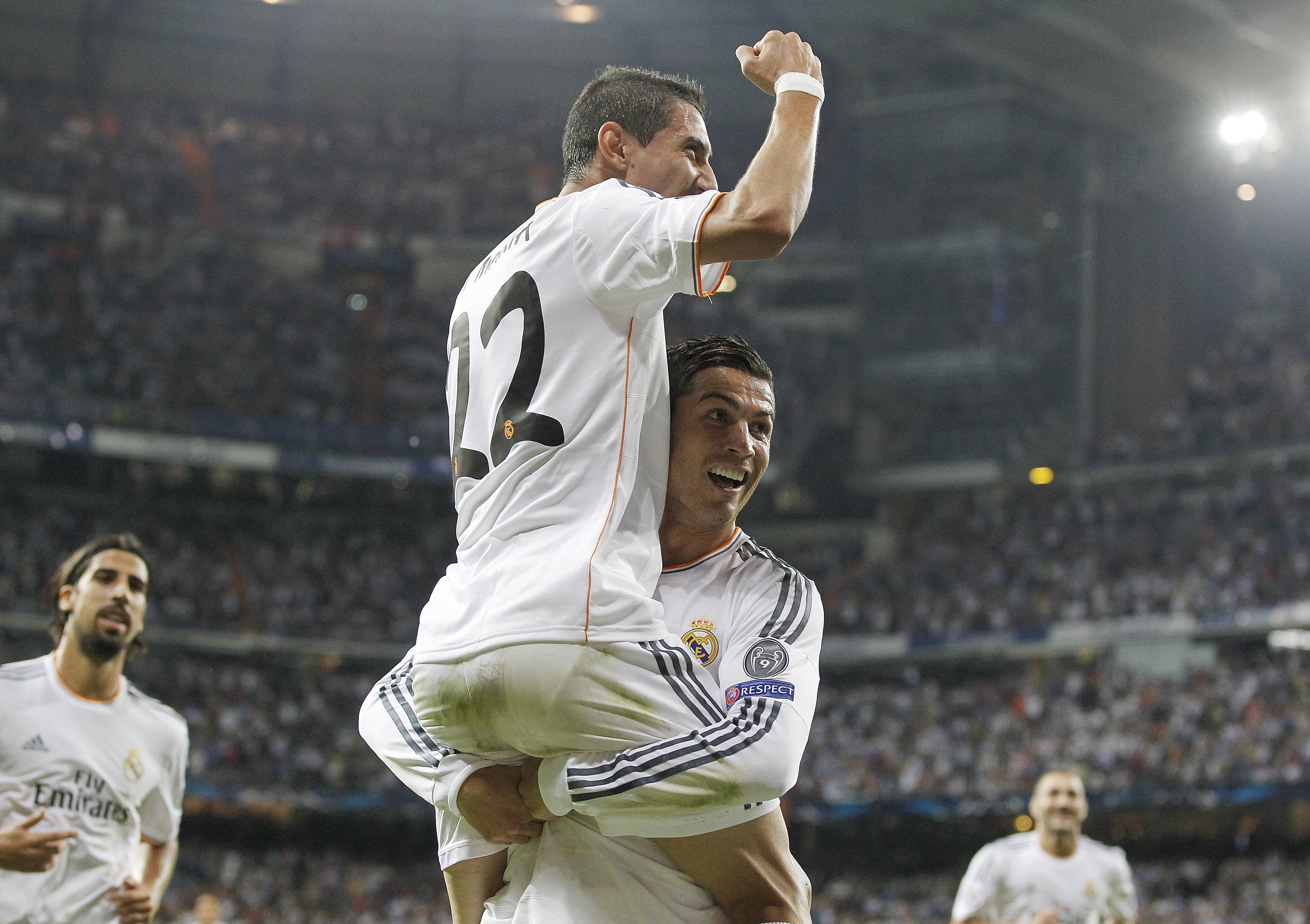 Ángel di María y Cristiano Ronaldo celebran un gol con el Real Madrid