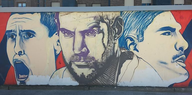 Prigioni, Nocioni y Scola en uno de los grafitis que ilustran la historia del Baskonia en un muro del barrio de Ariznavarra