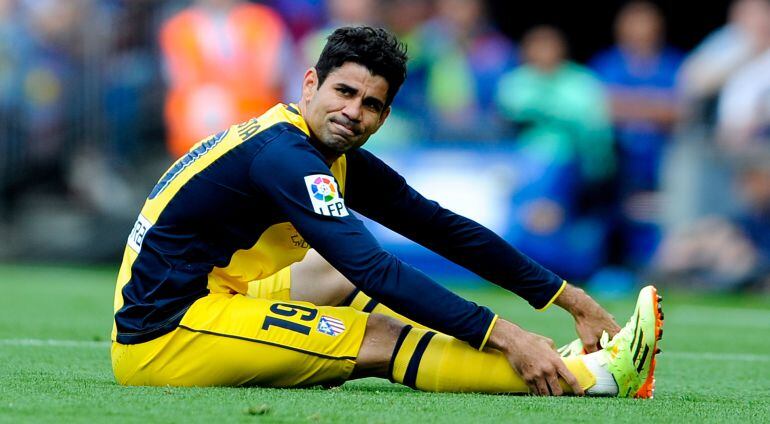 Diego Costa, tras caer lesionado en su última visita al Camp Nou