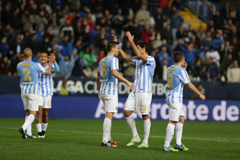 Los jugadores malaguistas celebran un gol ante el Deportivo
