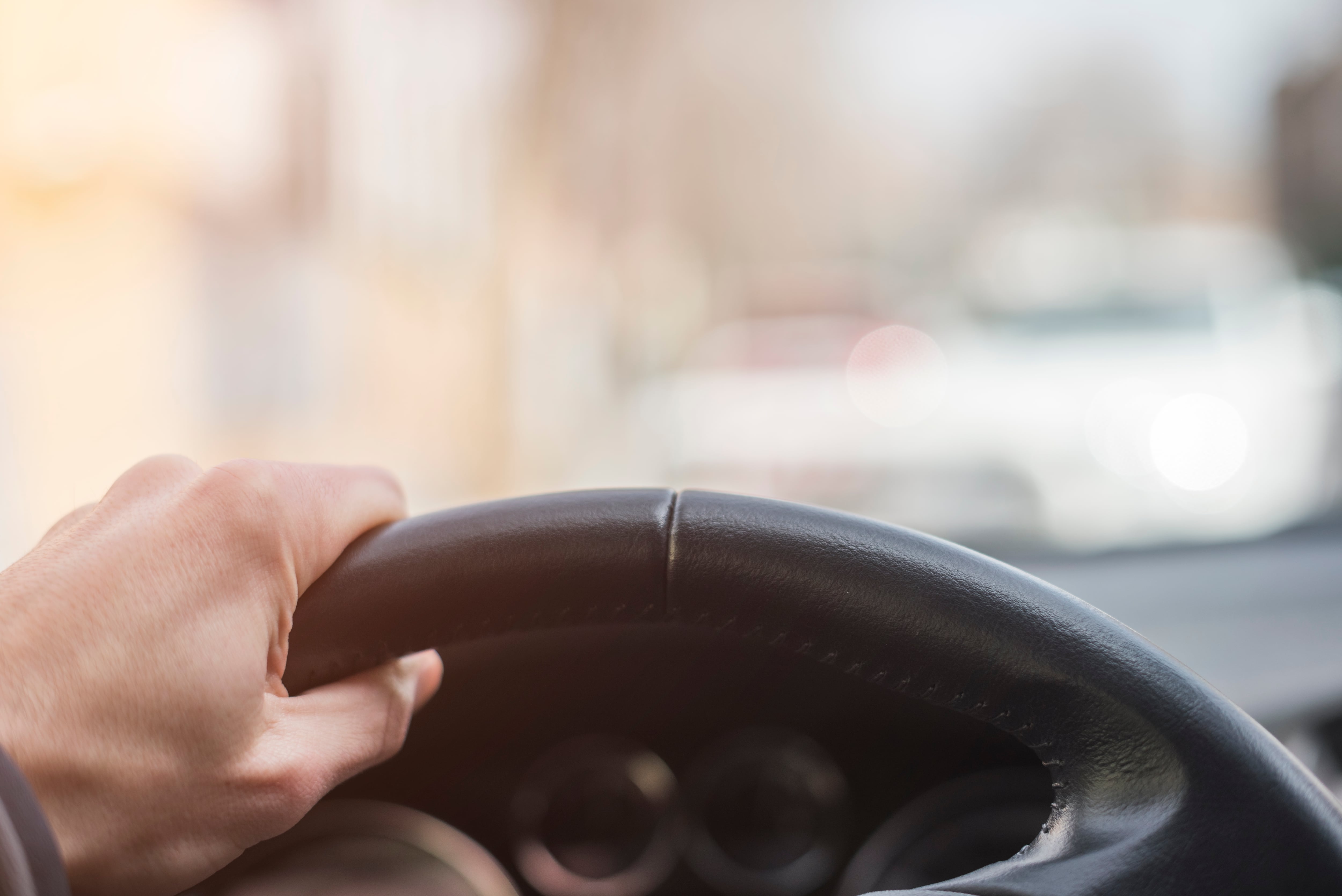 Photography inside a car with a wman driving his car