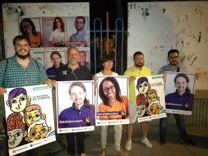 Pegada de carteles para las elecciones del 26J