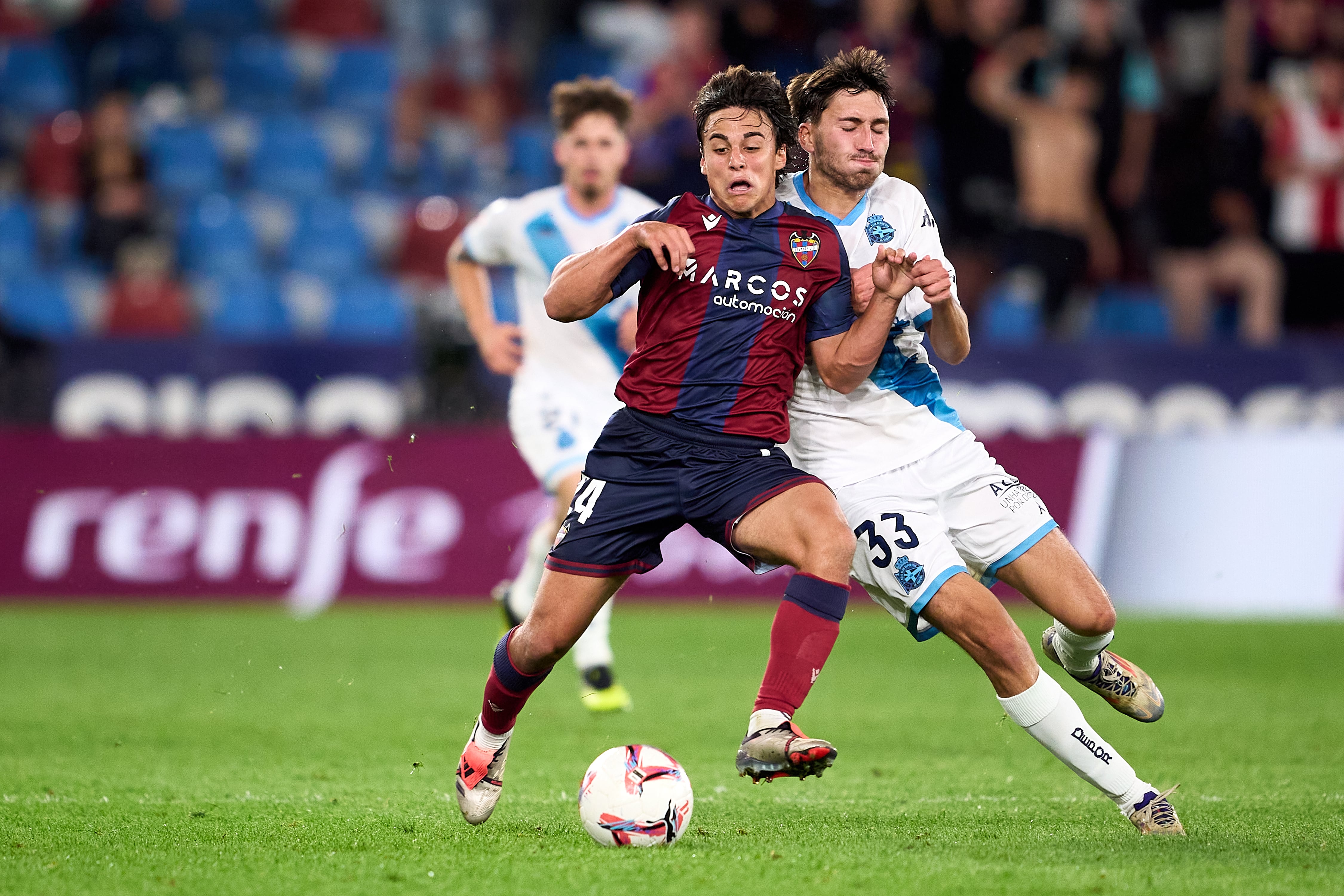 VALENCIA, SPAIN - OCTOBER 24: Carlos Alvarez of Levante UD competes for the ball with Rafael Obrador of RC Deportivo during the La Liga Hypermotion match between Levante UD and RC Deportivo at Ciutat de Valencia on October 24, 2024 in Valencia, Spain. (Photo by Manuel Queimadelos/Quality Sport Images/Getty Images)